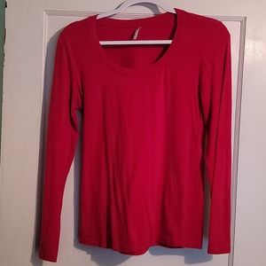 Red, long sleeved tee.